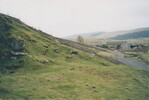 Winnats Head Cave / Entrance with farm in background